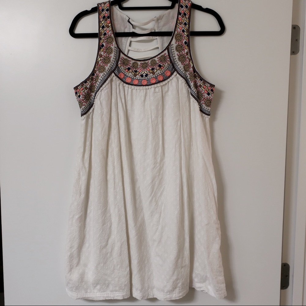 White dress with colorful accents